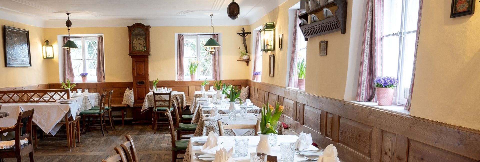Gourmet restaurant with traditional furniture at Schlosswirt zu Anif in the south of Salzburg