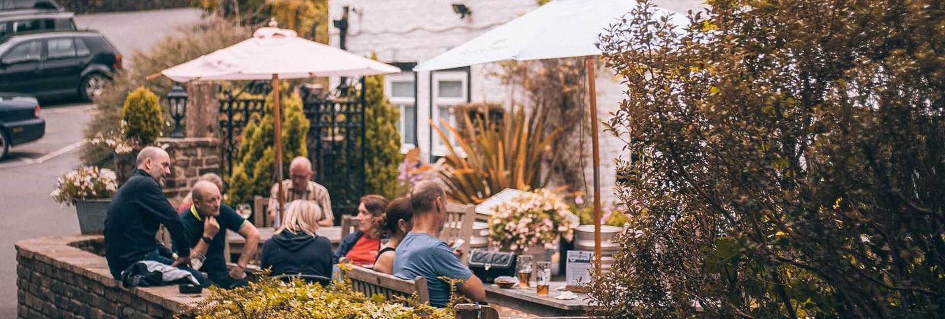 Terrace with people in front of the Shibden Mill Inn