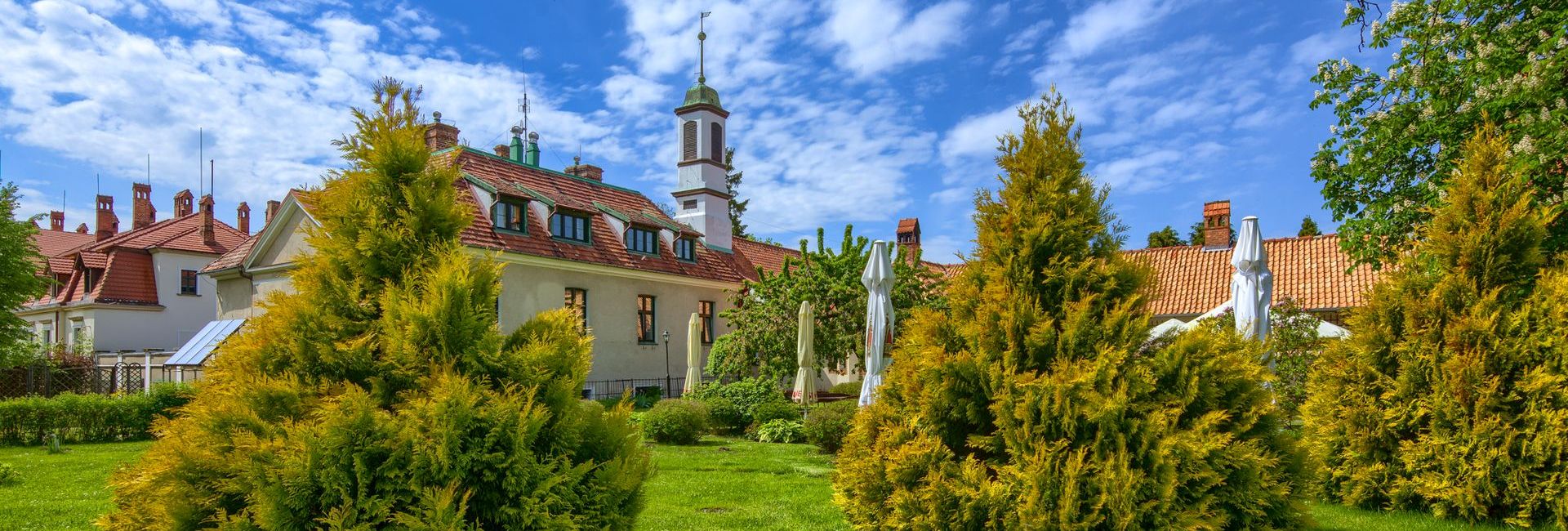 Kadyny Folwark Hotel & Spa with garden and trees in Tolkmicko, Poland